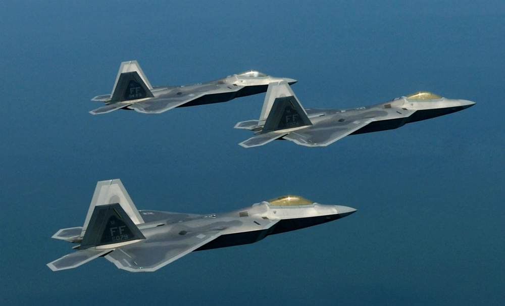 F-22 Raptors fly in formation. The Air Force's first four pilots to go directly to the F-22 without previous fighter experience are currently training at Luke Air Force Base, Ariz., in preparation for taking on the F-22. (U.S. Air Force photo/Staff Sgt. Samuel Rogers)