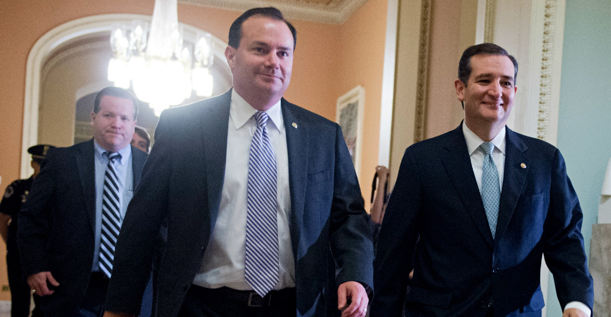 UNITED STATES - OCTOBER 16: Sens. Mike Lee, R-Utah, left, and Ted Cruz, R-Texas, make their way to the Senate floor in the Capitol where the Senate voted to end the government shutdown and raise the nation's debt ceiling. (Photo By Tom Williams/CQ Roll Call)